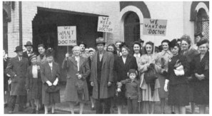 As per Bill King, DC... The picture above is outside the Cincinnati, Ohio jail, 1946. Dr. herb Reaver was arrested for practicing Chiropractic without a liscense. He was serving a 6 mos. jail term. The cute little boy in the front is me, Bill King, 1963 Palmer graduate, Delt brother. My mother is to the right of the lady with the sign, light colored coat. Millie Reaver is right of her, dark coat. My mother was instrumental in organizing Dr. Reaver's patients to show support and protest his being in jail.